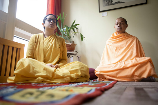 Monastics in meditation rooms