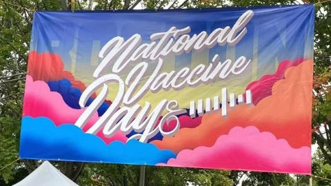 Banner displaying words National Vaccine Day